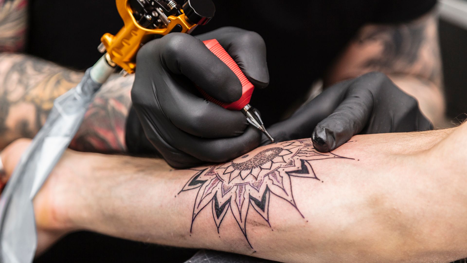 Wales brings in new rules for tattoo artists and body piercers