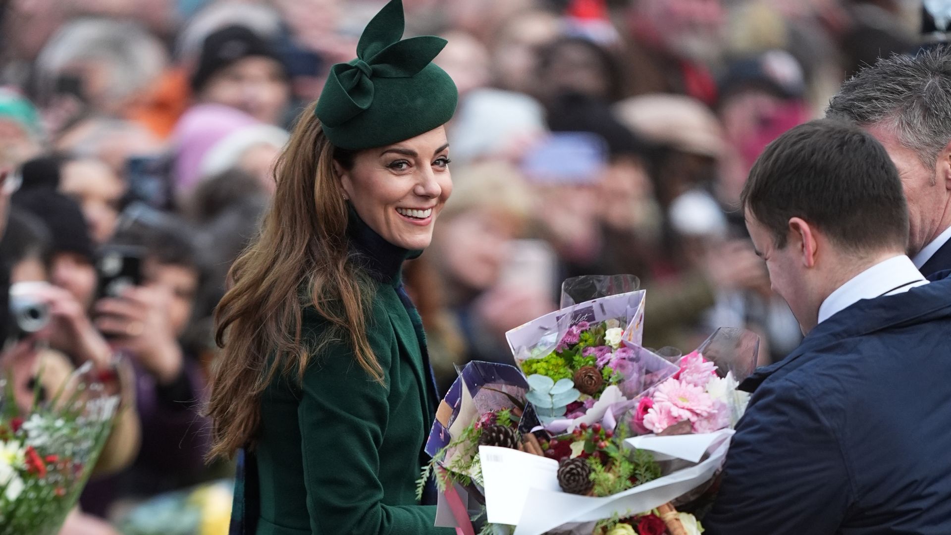 Princess of Wales 'laden' with flowers after royals attend Christmas Day church service at Sandringham