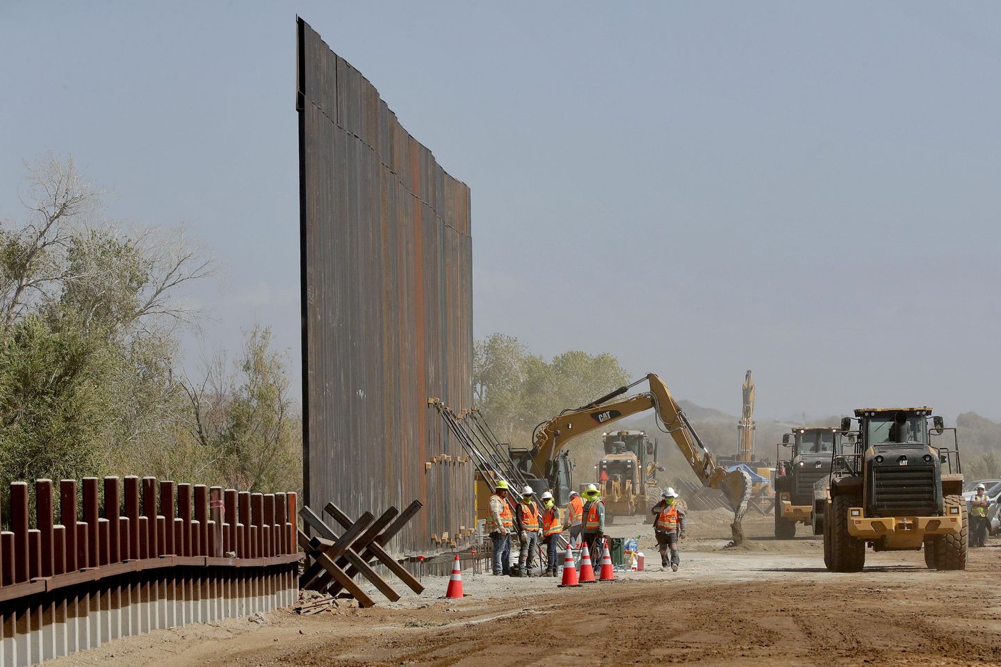 Biden administration says it's done selling off border wall materials -- for now