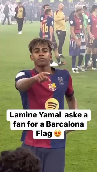  Lamine Yamal asks a fan for a