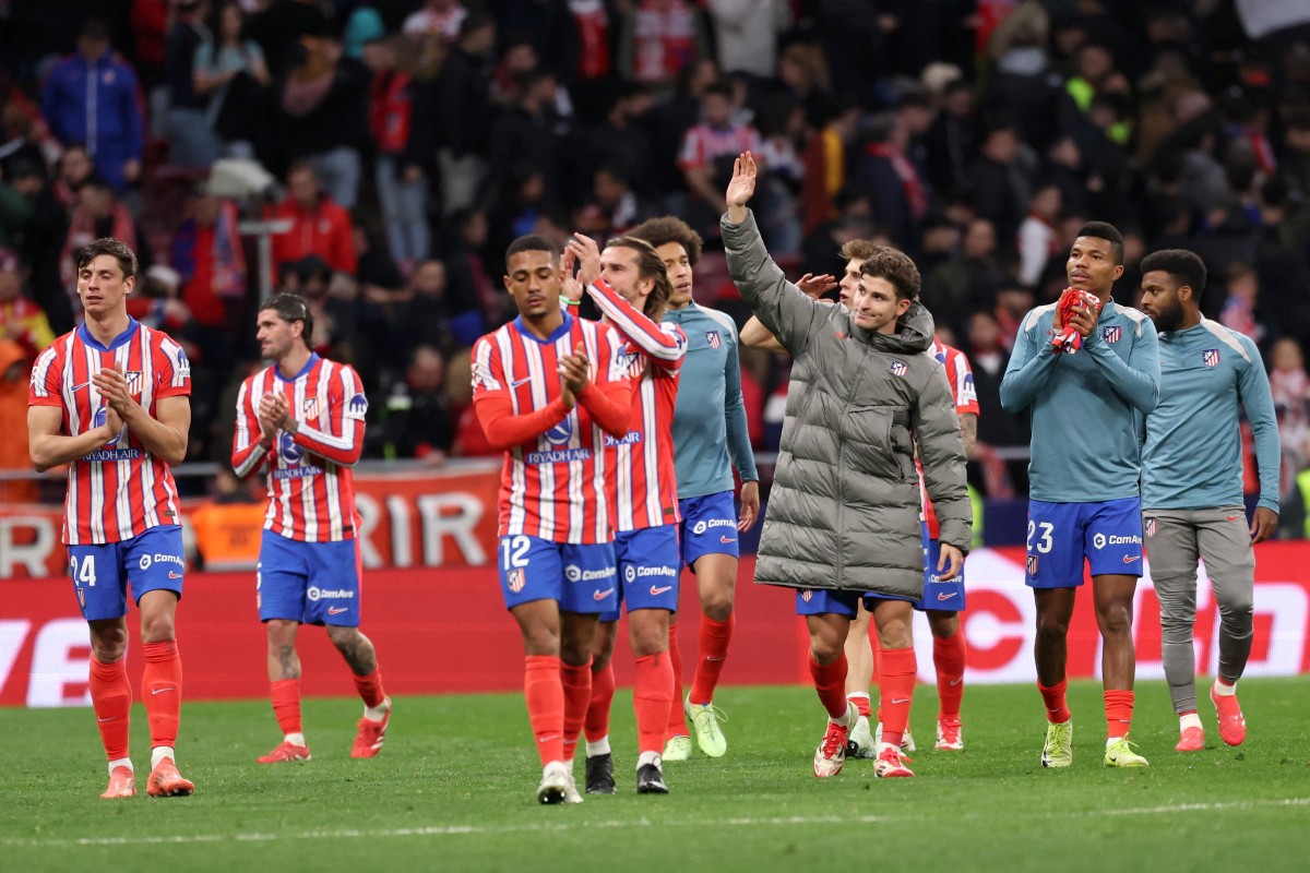 Atletico hold slender Liga lead as Spain's big two resume battle