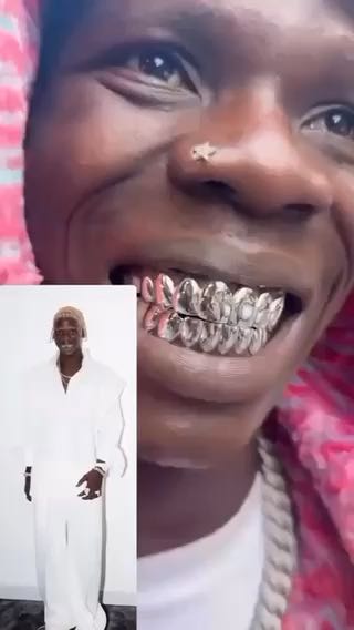  Seyi Vibez shows off his new grillz