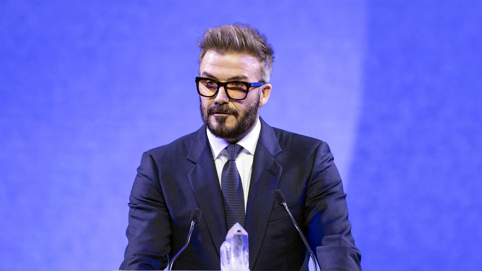 David Beckham says 'girls are held back' in awards speech