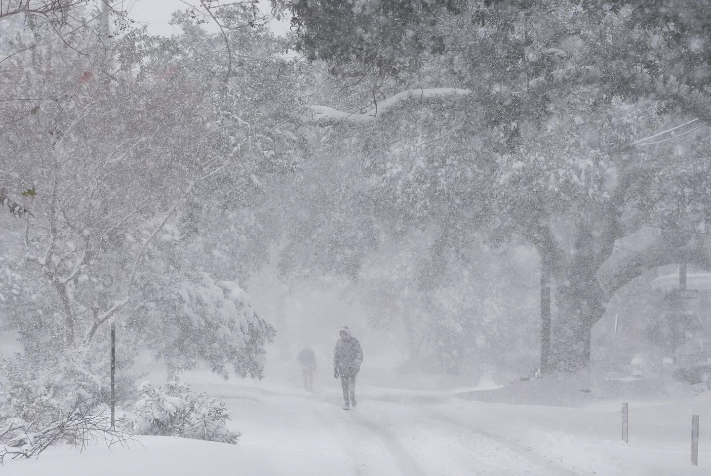 A frigid storm drops rare snow on Houston and New Orleans as Florida readies plows in the Panhandle