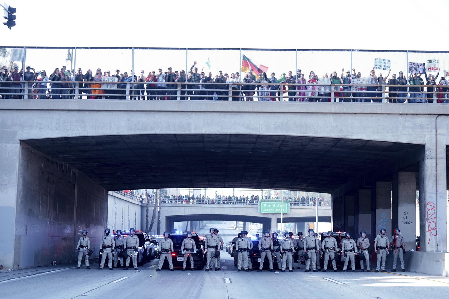 Marchers protesting deportations block major freeway in Los Angeles