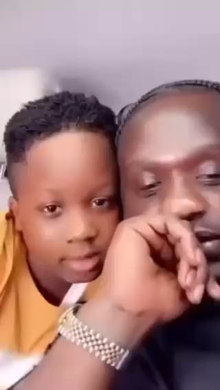  Between Wande Coal and his cute son