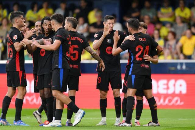 Olmo fires Liga leaders Barca past Mallorca