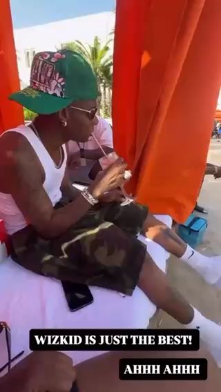  Wizkid and his team chilling poolside before