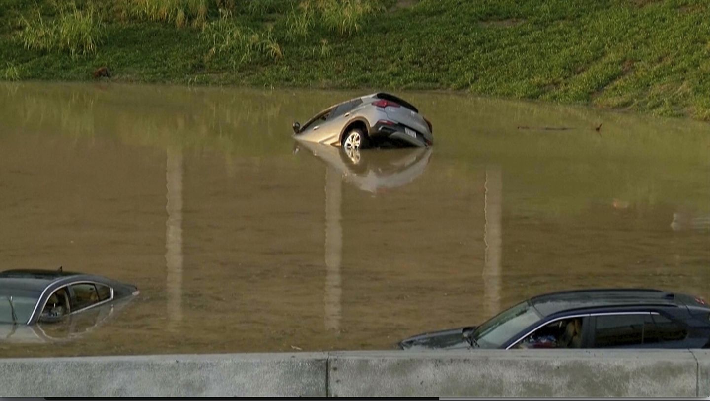 Parents and child killed when tree falls on car as heavy rain and flooding hit Tennessee