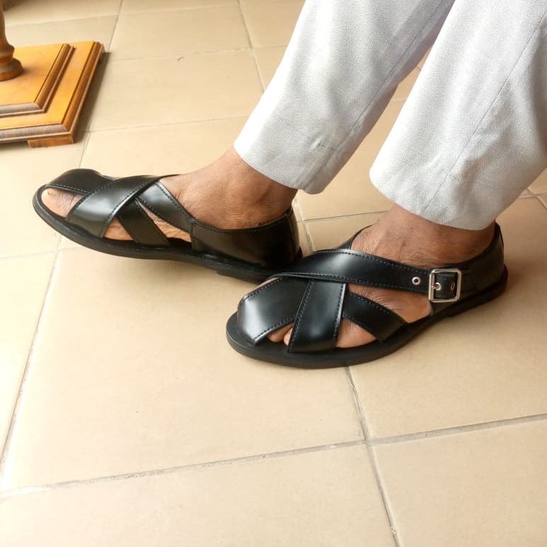 Sleek sandal on the feet 